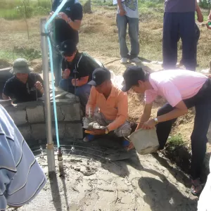 Technical agricultural biogas training during a site visit, 2012.
